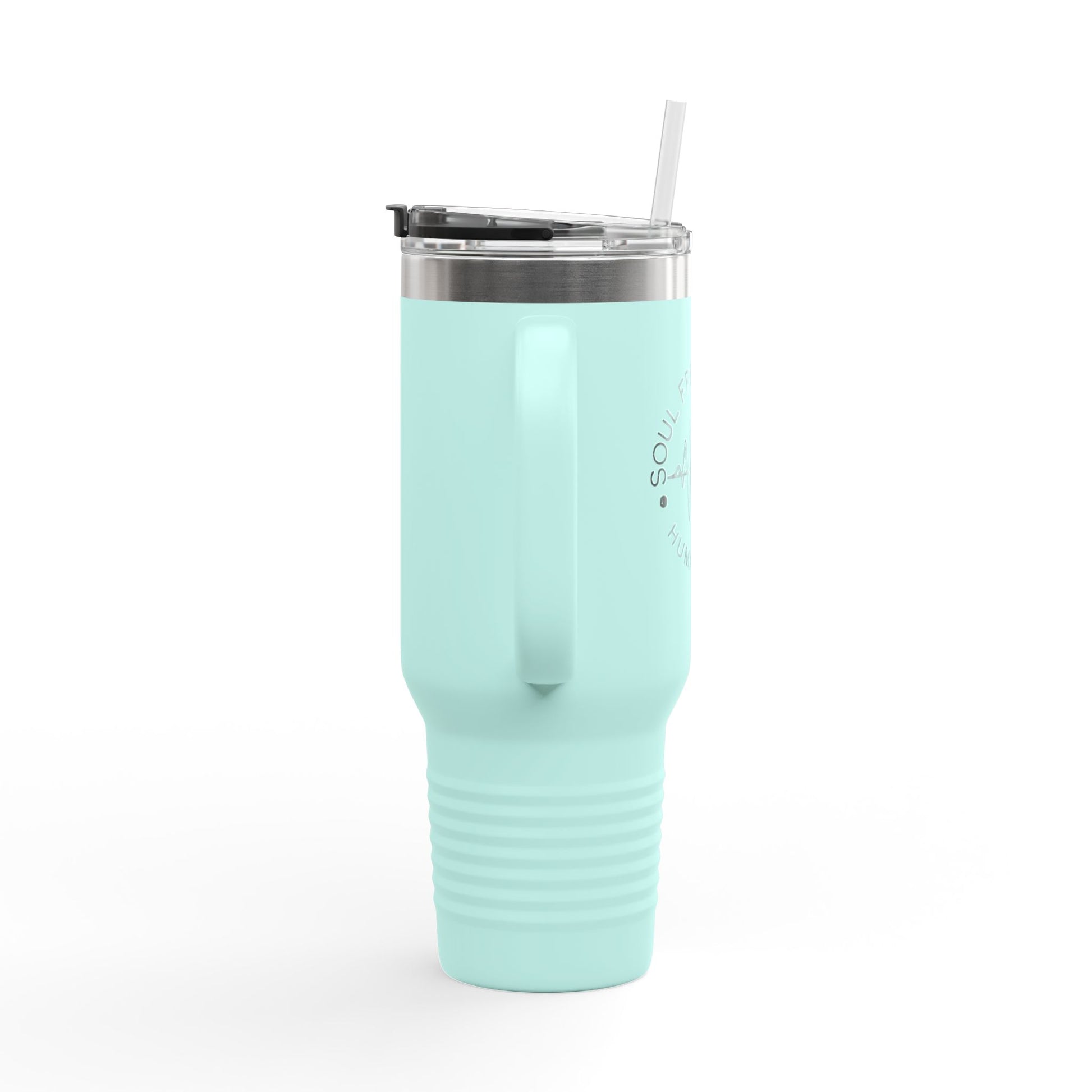 Side angle of the teal Soul Frequencies insulated tumbler, showcasing its sleek design and ergonomic handle.