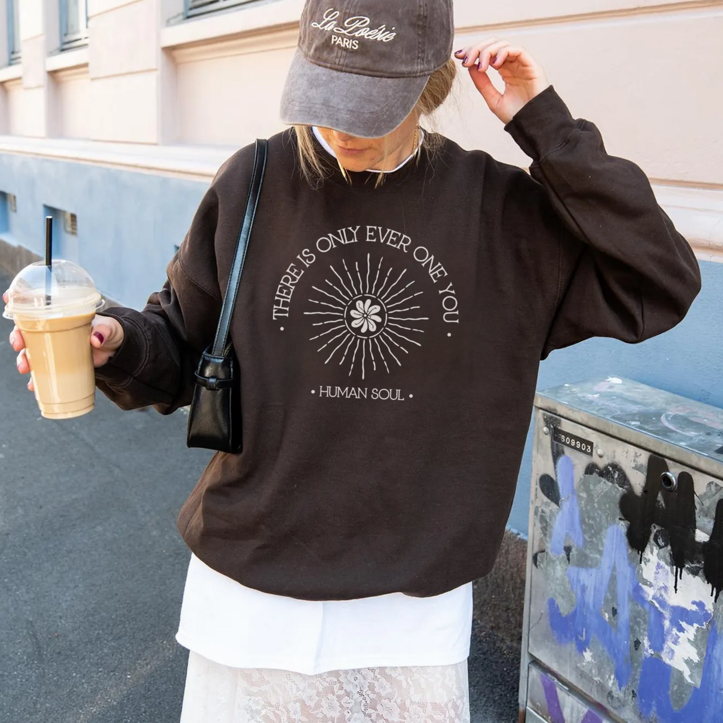 Model wearing the Self Love Sweatshirt, featuring the message 'There Is Only Ever One You,' promoting self-worth and confidence.