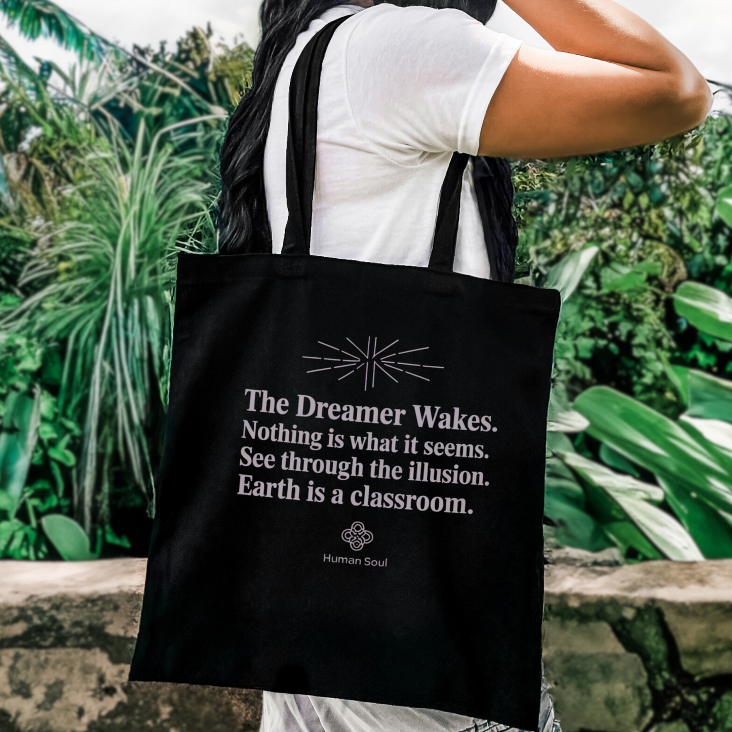 The Dreamer Wakes Tote Bag featuring a spiritual awakening quote in a minimalist, modern design.