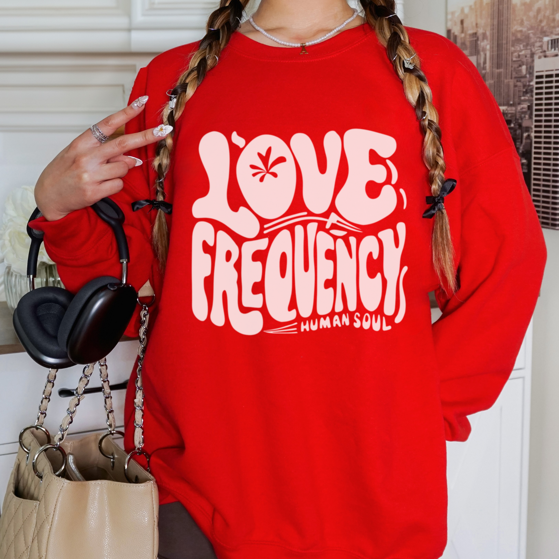 Love Frequency Sweatshirt featuring a high-vibration message for positive energy and spiritual alignment.