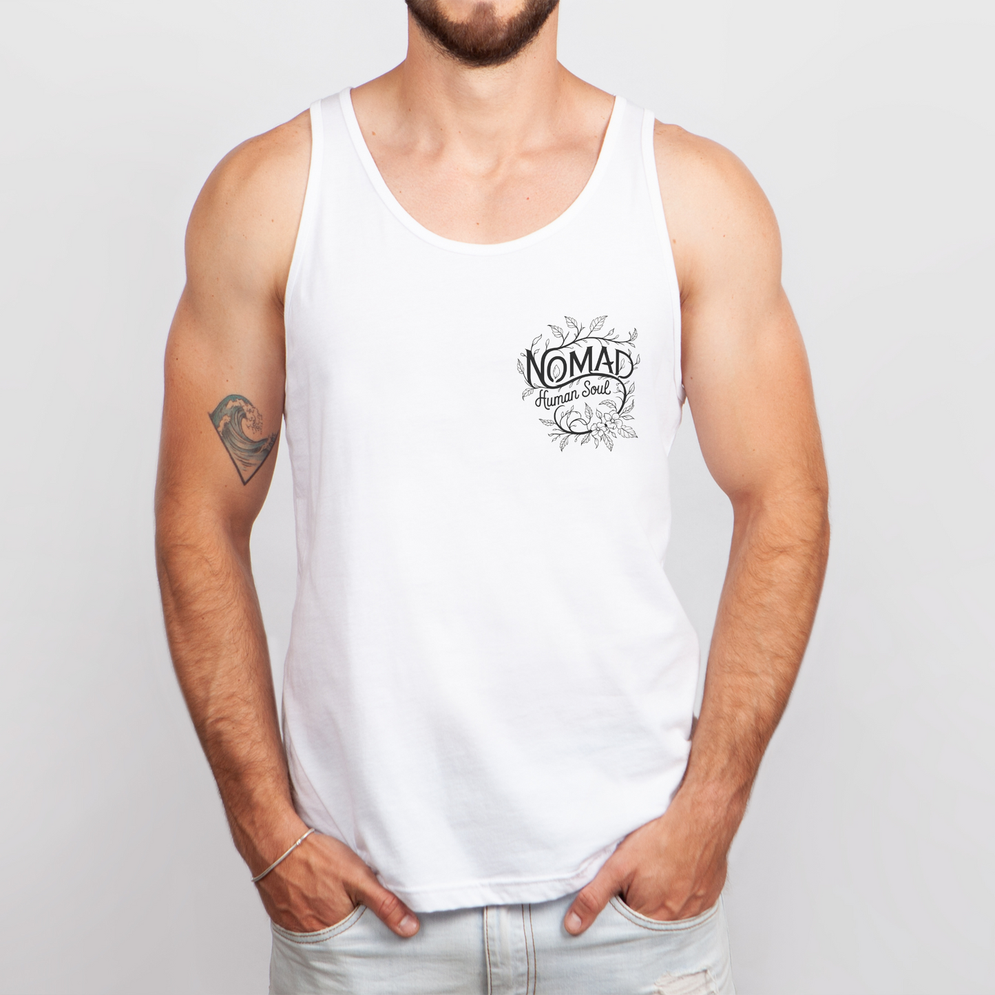 Front view of Nomad Men's Tank Top with a floral tattoo pocket design.