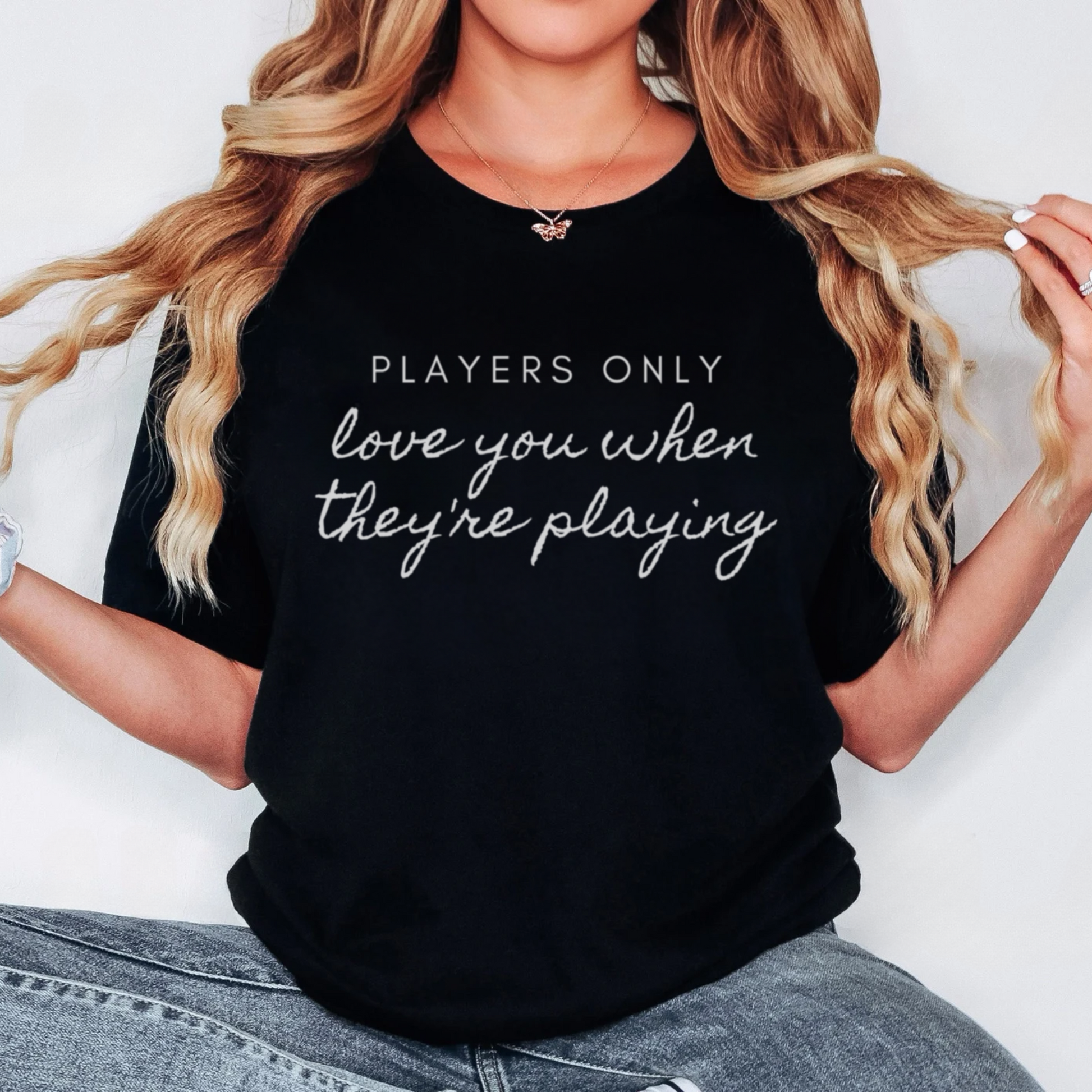 Women's t-shirt featuring 'Players Only Love You When They're Playing' text, inspired by Fleetwood Mac lyrics.