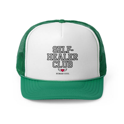 Self Healer Club green and white mesh trucker hat, a stylish cap for wellness enthusiasts and energy healers.